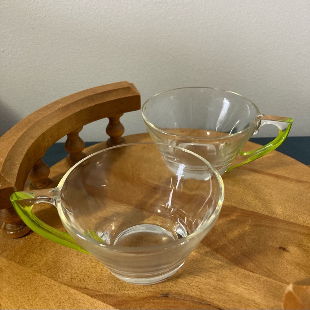 Two MCM glasses with green handles